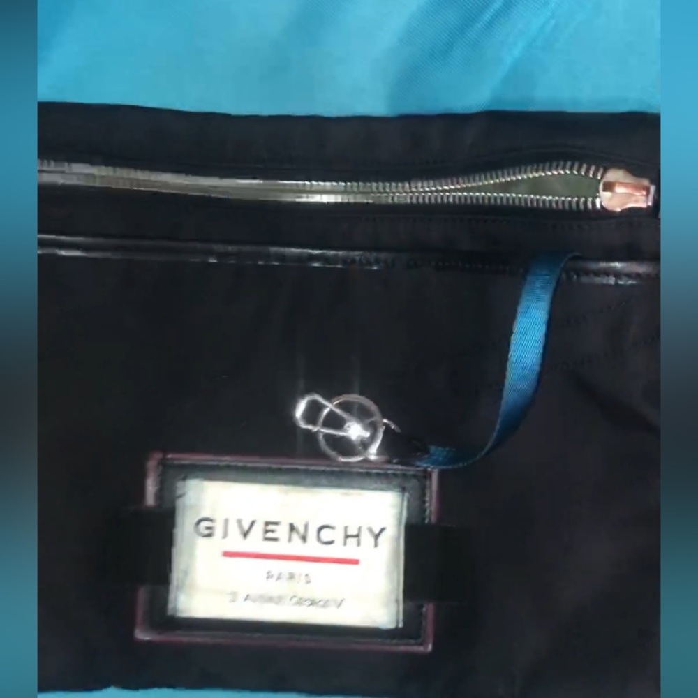 Givenchy Polamide strap bag for men.